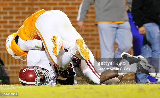 Amari Cooper of the Alabama Crimson Tide pulls in this touchdown reception against LaDarrell McNeil of the Tennessee Volunteers at Neyland Stadium on...