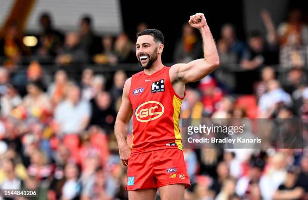 Rory Atkins of the Suns celebrates after kicking a goal during the round 18 AFL match between Gold Coast Suns and St Kilda Saints at Heritage Bank...