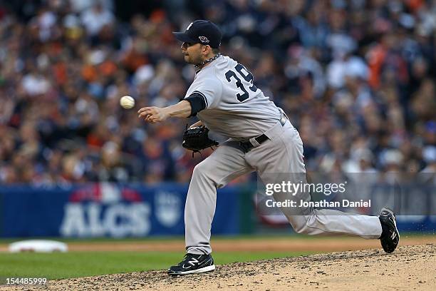 Clay Rapada of the New York Yankees throws a pitch against the Detroit Tigers during game four of the American League Championship Series at Comerica...