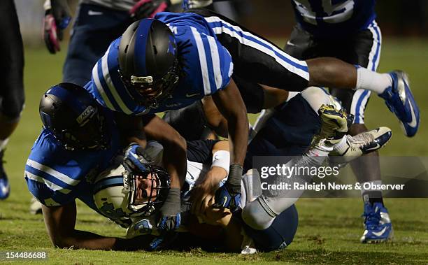 Duke defensive end Kenny Anunike flattens North Carolina quarterback Bryn Renner in the third quarter. The Duke Blue Devils beat the North Carolina...