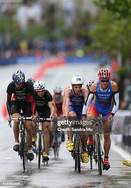 Javier Gomez of Spain , Jonathan Brownlee of Great Britain and Sven Riederer of Switzerland compete in the cycle leg during the 2012 ITU World...