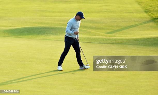 Northern Ireland's Rory McIlroy celebrates his putt on the 18th green on day one of the 151st British Open Golf Championship at Royal Liverpool Golf...