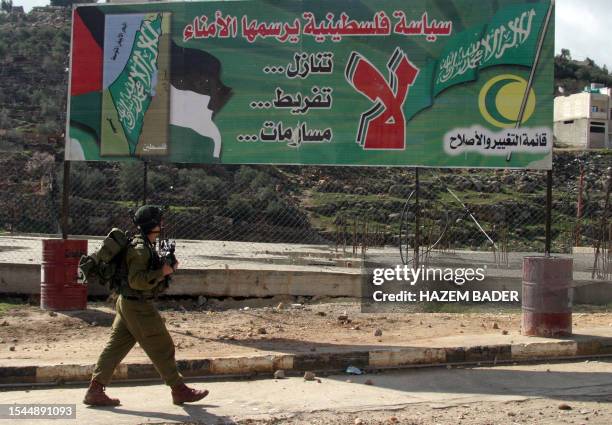 Israeli solders enter Al-Fawar refugee camp near Hagay settlement this morning in the West bank town of Hebron 17 January 2006. The Israeli army...