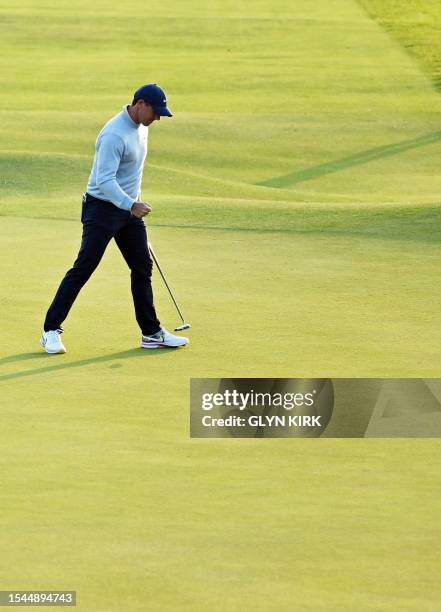Northern Ireland's Rory McIlroy celebrates his putt on the 18th green on day one of the 151st British Open Golf Championship at Royal Liverpool Golf...