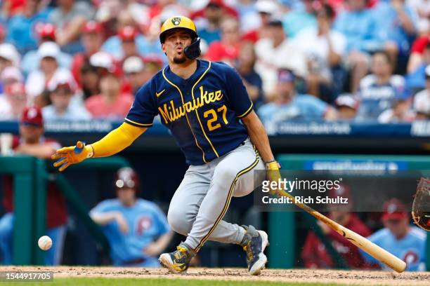 Willy Adames of the Milwaukee Brewers fouls the ball off his foot against the Philadelphia Phillies during the sixth inning of a game at Citizens...