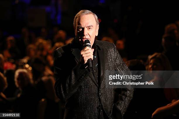 Singer Neil Diamond performs during the 26th Anniversary Carousel Of Hope Ball presented by Mercedes-Benz at The Beverly Hilton Hotel on October 20,...