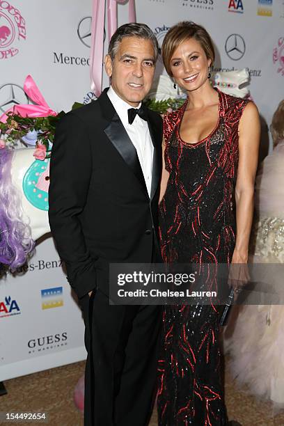 Actors George Clooney and Stacy Keibler attend Mercedes-Benz presents The Carousel of Hope on October 20, 2012 in Los Angeles, California.