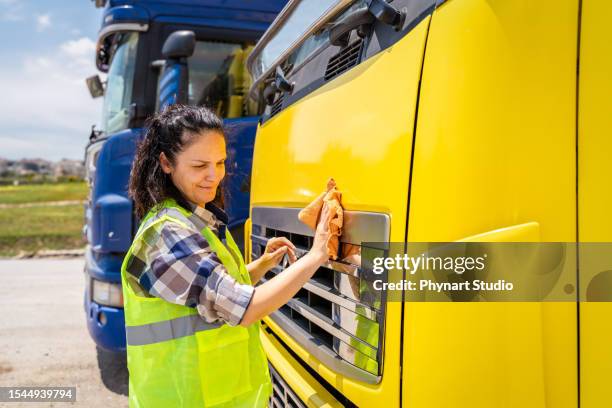 professional female truck driver - semi truck headlight stock pictures, royalty-free photos & images