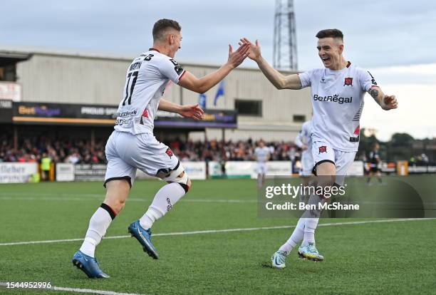 Louth , Ireland - 20 July 2023; John Martin of Dundalk celebrates with teammate Darragh Leahy after scoring their side's second goal during the UEFA...