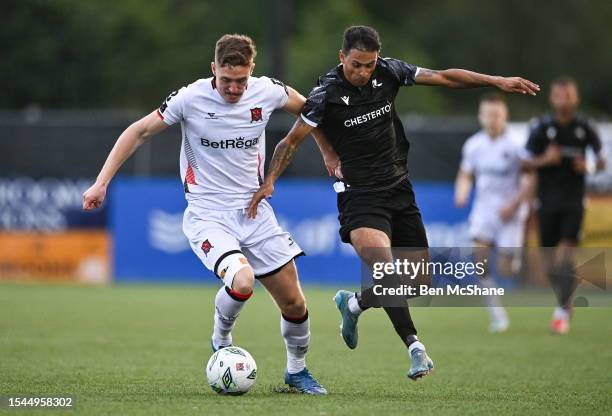 Louth , Ireland - 20 July 2023; John Martin of Dundalk in action against Andre Dos Santos of FC Bruno's Magpies during the UEFA Europa Conference...