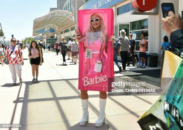 Barbie cosplayer arrives for San Diego Comic-Con International in San Diego, California, on July 20, 2023.