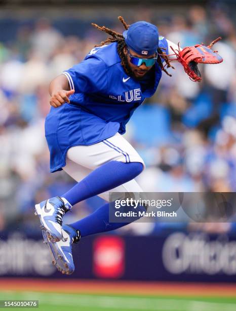 Vladimir Guerrero Jr. #27 of the Toronto Blue Jays celebrates by jumping following the contest against the San Diego Padres in their MLB game at the...