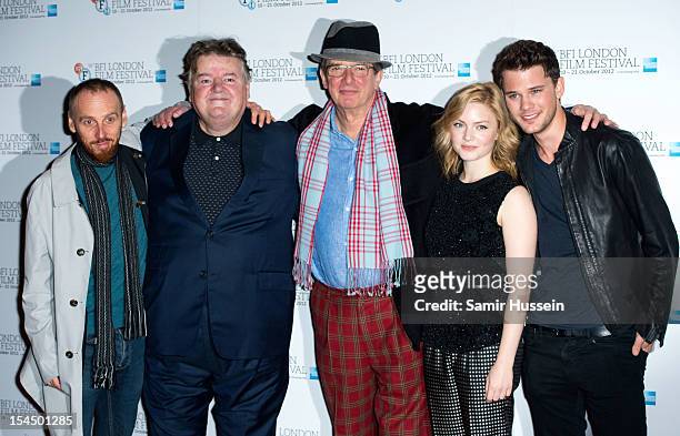 Ewen Bremner, Robbie Coltrane, director Mike Newell, Holliday Grainger and Jeremy Irvine attend the photocall for 'Great Expectations' during the...