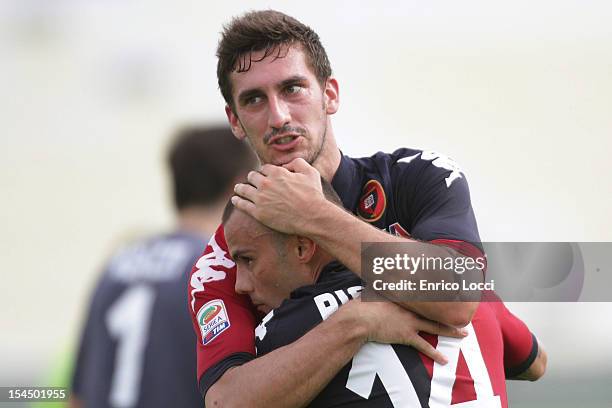 Davide Astori and Francesco Pisano of Cagliari celebrate during the Serie A match between Cagliari Calcio and Bologna FC at Stadio Sant'Elia on...