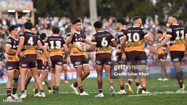 Brisbane Broncos players celebrates after victory during the round 20 NRL match between Canterbury Bulldogs and Brisbane Broncos at Belmore Sports...