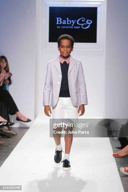 Model walks the runway at the Baby CZ show during Petite Parade NY Kids Fashion Week In Collaboration With VOGUEbambini at Industria Superstudio on...