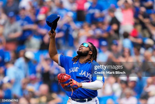 Vladimir Guerrero Jr. #27 of the Toronto Blue Jays celebrates his team defeating the San Diego Padres in their MLB game at the Rogers Centre on July...