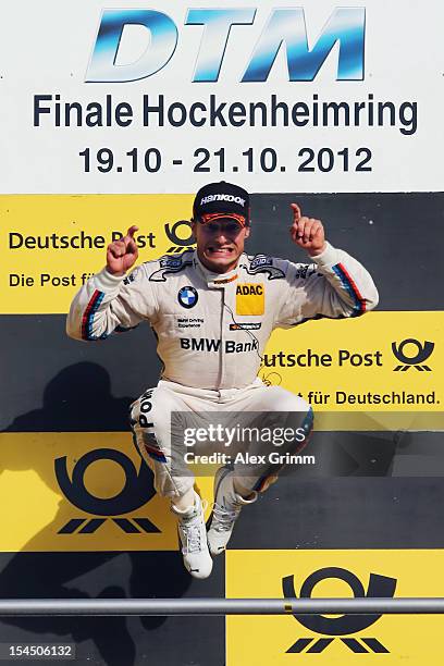 Bruno Spengler of Canada and BMW Team Schnitzer celebrates after winning the DTM 2012 German Touring Car Championship after the final run at the...