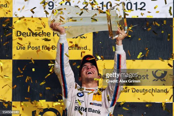 Bruno Spengler of Canada and BMW Team Schnitzer celebrates after winning the DTM 2012 German Touring Car Championship after the final run at the...