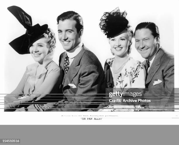 Alice Faye, John Payne, Betty Grable and Jack Oakie in publicity portrait for the film 'Tin Pan Alley', 1940.
