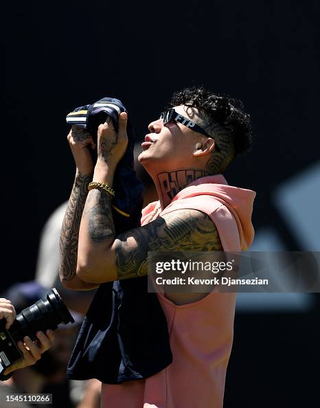 Peluma Rapper Mexican rapper Peso Pluma reacts after he was gifted a Real Madrid ...