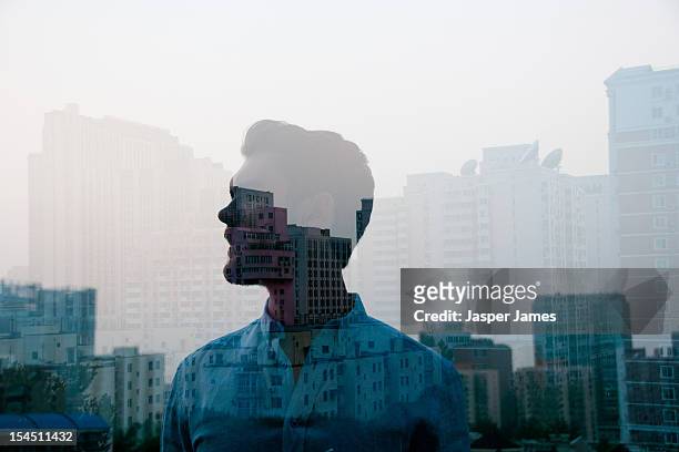 double exposure of man and cityscape - blend bildbanksfoton och bilder