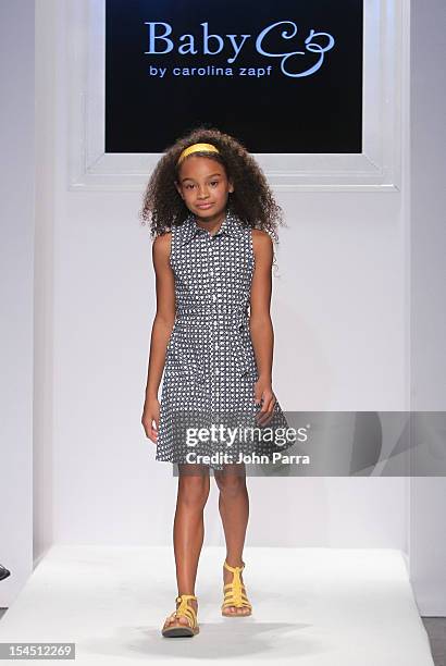 Model walks the runway at Baby CZ show during Petite Parade NY Kids Fashion Week In Collaboration With VOGUEbambini at Industria Superstudio on...