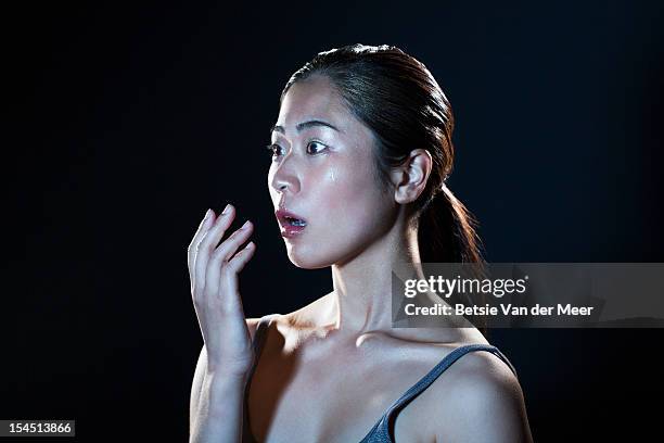 asian woman looking shocked surprised. - surprise ストックフォトと画像