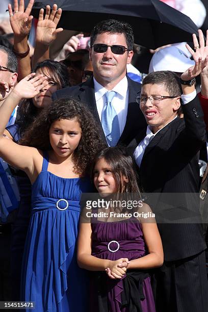 Jake Finkbonner , of Ferndale, Washington, and his family attend a canonisation ceremony held by Pope Benedict XVI in St. Peter's Square on October...