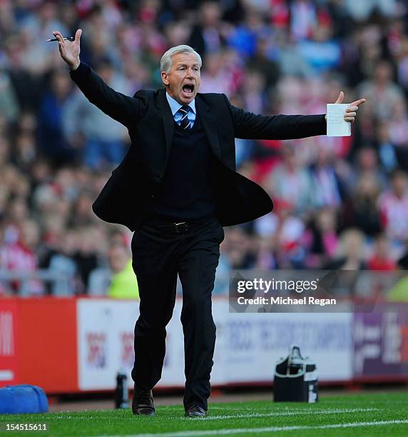 Newcastle manager Alan Pardew shouts instructions during the Barclays Premier League match between Sunderland and Newcastle United at the Stadium of...