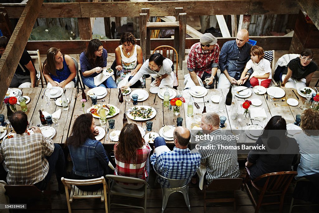 Group of friends and family dining overhead view