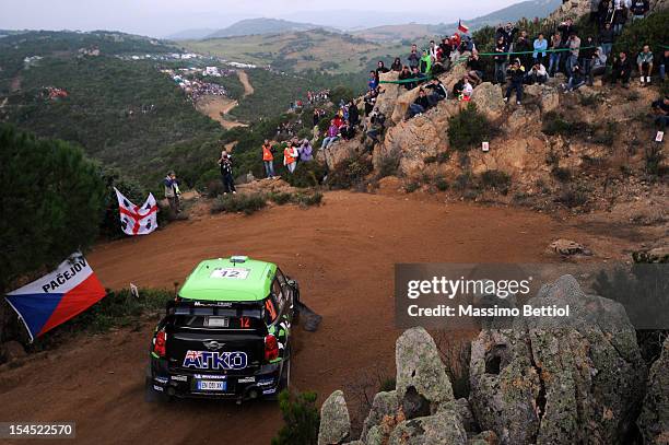 Chris Atkinson of Australia and Stephane Prevot of Belgium compete in their WRC Team Mini Portugal Mini John Cooper Works WRC during Day Three of the...