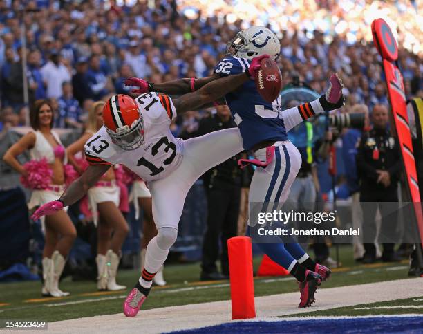 Cassius Vaughn of the Indianapolis Colts knocks Josh Gordon of the Cleveland Browns out of bounds at Lucas Oil Stadium on October 21, 2012 in...