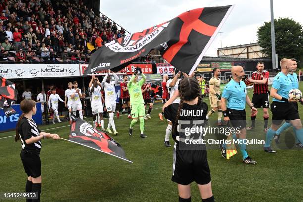 Crusaders and Haka take to the pitch before the UEFA Europa Conference First Qualifying Round 2nd leg match between Crusaders and Haka at Seaview on...