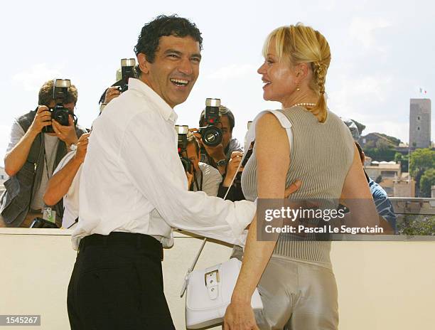 Actor Antonio Banderas and his wife actress Melanie Griffith attend the screening of director Brian De Palma's film "Femme fatale" May 25, 2002 in...