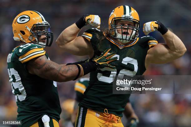 Outside linebacker Clay Matthews of the Green Bay Packers celebrates his sack of quarterback Sam Bradford of the St. Louis Rams with defensive end...