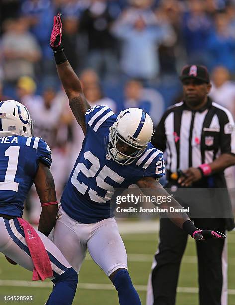 Jerraud Powers of the Indianapolis Colts celebrates breaking up a pass near the end of a game against the Cleveland Browns at Lucas Oil Stadium on...