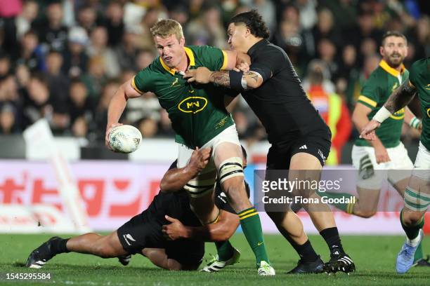 Duane Vermeulen of South Africa is tackled during The Rugby Championship match between the New Zealand All Blacks and South Africa Springboks at Mt...