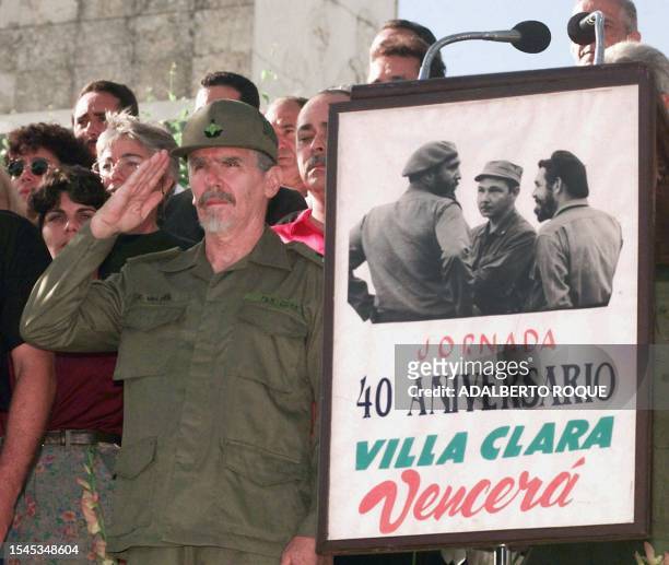 Commander of the Revolution Ramiro Valdes salutes during a ceremony marking the 40th anniversary a meeting between Fidel Castro, Raul Castro and...