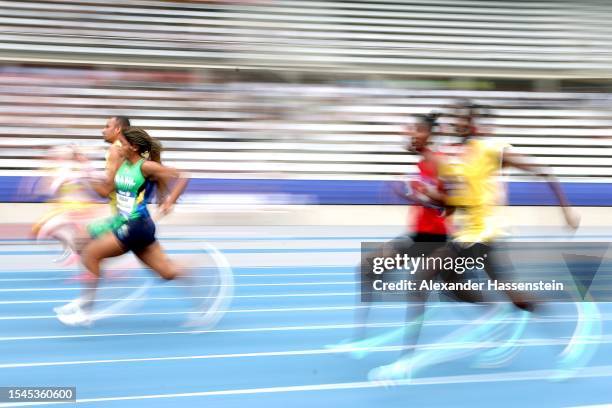 Lorraine Gomes and her guide MARTINS Fernando Martins compete in the Women's 100m T12 Semifinal during day eight of the World Para Athletics...