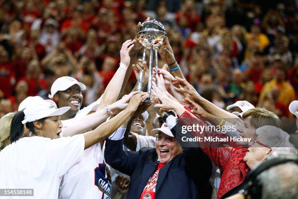 Owner Herb Simon of the Indiana Fever hoists the WNBA Championship trophy after defeating the Minnesota Lynx in Game Four of the 2012 WNBA Finals on...