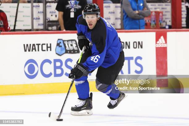 Robert Farnham of Team Johnston skates with the puck during a 3Ice game on July 19 at Prudential Center in Newark, New Jersey.