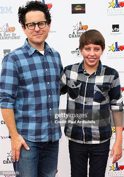 Director JJ Abrams and Actor Ryan Lee attend "A Day Of Champions" benefiting the Bogart Pediatric Cancer Research Program at the Sports Museum of Los...