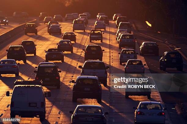 People drive on Highway 134 at the end of the evening rush hour in Glendale, California on September 3 before the start of the three-day Labor Day...