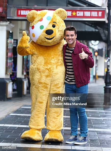 Joe McElderry poses at a photocall ahead of his performance in Thriller for Children In Need's Pop Goes The Musical at Lyric Theatre on October 22,...