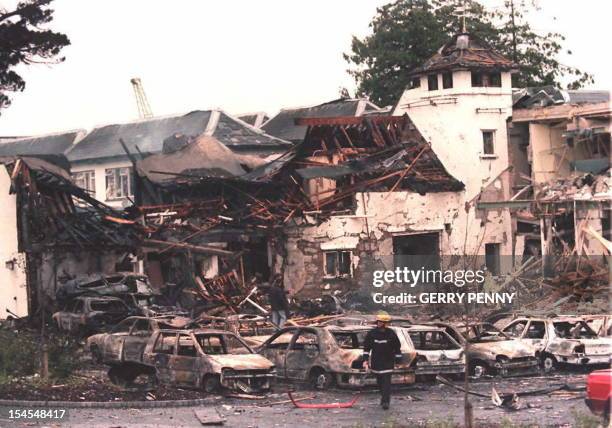 The remains of the Killyhelvin Hotel, Enniskillen, after a car bomb exploded the hotel, 14 July. It is the first bombing in Northern Ireland since...