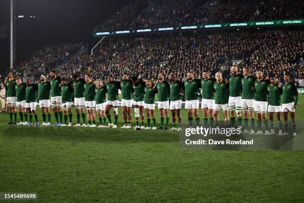 South Africa stand for the national anthems during The Rugby Championship match between the New Zealand All Blacks and South Africa Springboks at Mt...