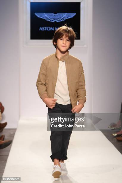 Model walks the runway at the Aston Martin show during Petite Parade NY Kids Fashion Week In Collaboration With VOGUEbambini - Day 2 at Industria...