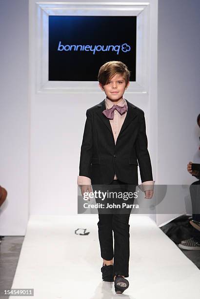 Model walks the runway at the Bonnie Young show during Petite Parade NY Kids Fashion Week In Collaboration With VOGUEbambini - Day 2 at Industria...