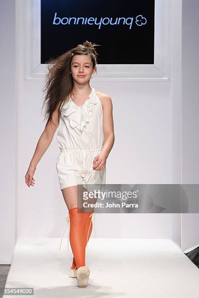 Model walks the runway at the Bonnie Young show during Petite Parade NY Kids Fashion Week In Collaboration With VOGUEbambini - Day 2 at Industria...